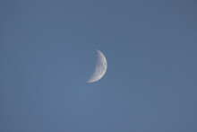 Half Moon In Blue Sky