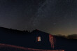 © Marcos Osorio/Stocksy - Mountain refuge under a starry sky