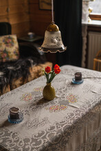 Flower Vase On Top Of Coffe Table On Cottage House