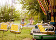 © Jelena Markovic/Stocksy - Merry-go-round ride in Amusement park
