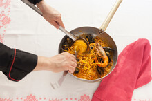 Chef Serving The Seafood Spaghetti