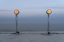 Lighting Lamps On Light Stands At Seashore