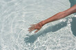 © Simone Wave/Stocksy - Hand touch water