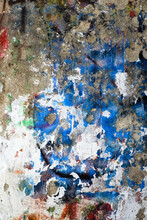 Decayed Concrete Wall With Blue And White Paint 