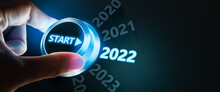 Happy New Year 2022,Finger About To Twist The Start Button 2022 With The Text 2021,2022,2023 And Start On Twist Button.Concept Of Planning,start,career Path,business Strategy,opportunity And Change