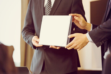 Employee gets a certificate of achievement, Businesspeople with certificate in the office, Businessman giving appreciation certificate to employee for achievement