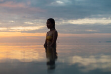 Woman At Sea Sunset