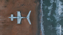 Overhead View Of A Military Plane On The Seacoast