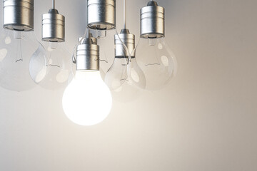 Aufkleber - Glowing light bulb on blurry concrete wall wallpaper. Idea, innovation, solution and invention concept. Mock up, 3D Rendering.