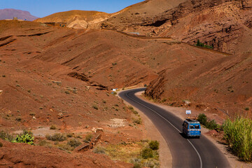 Wall Mural - The asphalt road through the Sahara desert in Morocco, Africa