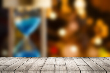 Wall Mural - Bokeh background with empty wooden deck table for product montage display