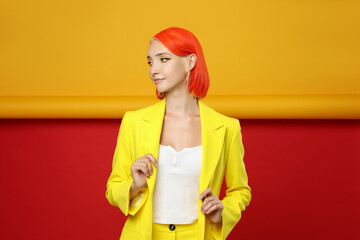beautiful young woman with bright dyed hair on color background