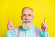 © deagreez - Photo of toothy old man point empty space wear blue shirt isolated on vivid yellow color background