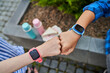 Close up phoro of kids smart watch of pink and blue color