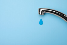 Paper Water Drop And Modern Tap On Light Blue Background, Flat Lay. Space For Text