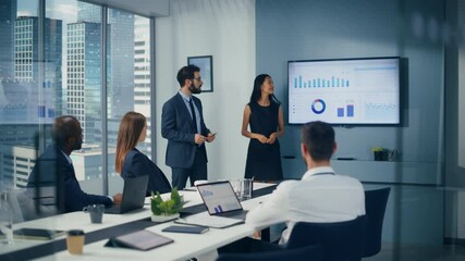 Leinwandbilder - Diverse Office Conference Room Meeting: Team of Male Executive and Female Top Manager Present e-Commerce Startup Stock Market Growth Statistics to a Group of Investors. Wall TV with Infographics Data
