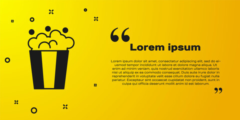 Poster - Black Popcorn in cardboard box icon isolated on yellow background. Popcorn bucket box. Vector