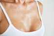 © GVS - Close up woman breasts in white underwear in drop of water or sweat on skin