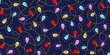 Christmas lights seamless repeat pattern, blue, yellow, red and pink lightbulbs on dark blue background