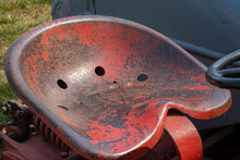 Rusty Metal Seat On An Antique Tractor