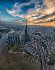 Wall Mural - Vertical photo of Ho Chi Minh city in the sunset sky