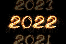 New Year's Eve 2022 of sparklers on a black background. Years Counting
