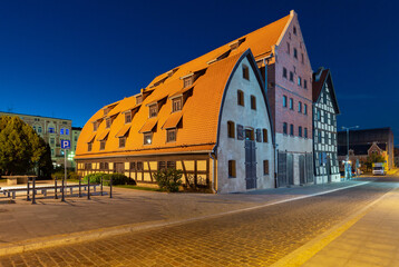 Wall Mural - Bydgoszcz. Ancient houses on the embankment in the early morning.