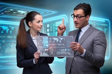 Poster - Pair of businessman and businesswoman discussing data