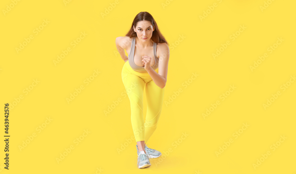 Sporty running woman on color background