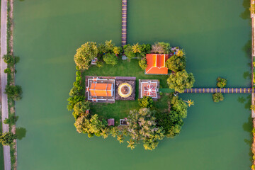 Wall Mural - Aerial view of Ancient Buddha statue at temple in Sukhothai Historical Park, Thailand.