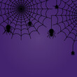 © Walaiporn Paysawat - Halloween banner with Spider Hanging from Cobweb on blue violet Background with night clouds and Copy Space place for text. paper cut style.Vector illustration.