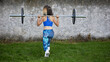 © JORGE CORCUERA - weightlifting of attractive Athletic woman in very good physical condition without recognizable face