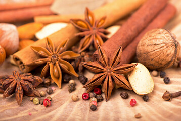 Sticker - Traditional Christmas spices - Star anise with cinnamon and cloves on dark rustic wooden background