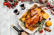 Roast duck with orange rosemary, and berries served on a festive table. Dish for Christmas Eve. banner, menu, recipe place for text, top view