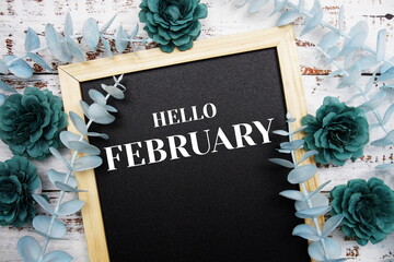 Poster - Hello February typography text and flower decoration on blackboard background