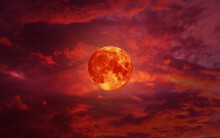 Blood Moon Concept Of A Red Full Moon In Black Sky With Cloud.
