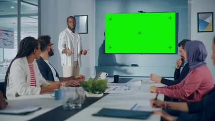 Aufkleber - Office Conference Room Meeting Presentation: Black Businessman Talks, Uses Green Screen Chroma Key Wall TV. Successfully Presenting a Product to Group of Multi-Ethnic Investors. e-Commerce Strategy
