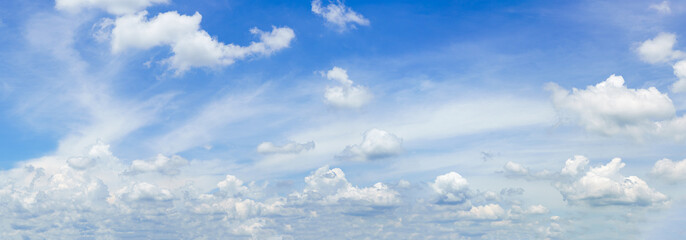 Wall Mural - Panorama fluffy clouds against in blue sky