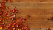 Seasonal Background, With Fall Leaves On Natural Wood Surface. Thanksgiving Concept With Space For Text.