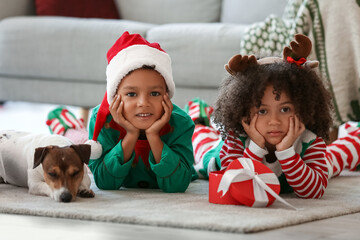 Sticker - Little African-American children with Christmas gift and dog at home