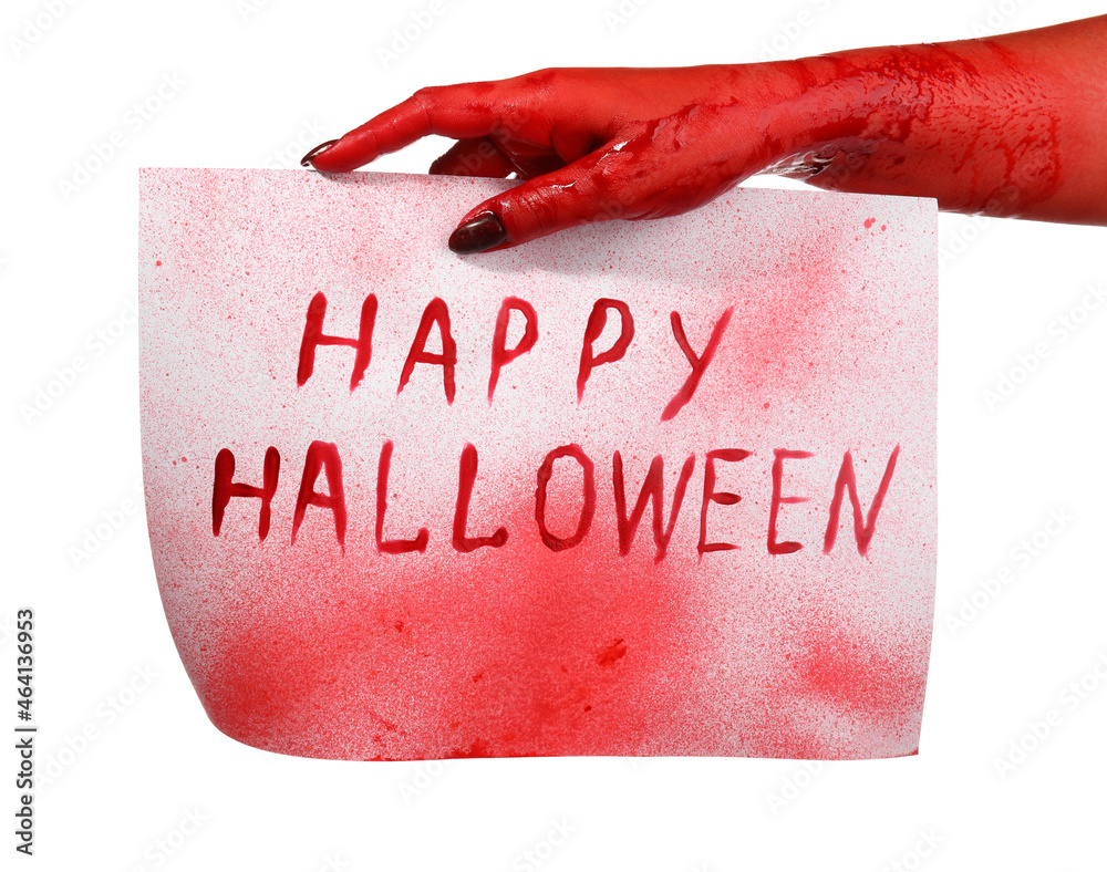 Bloodstained hand holding paper with text HAPPY HALLOWEEN on white background