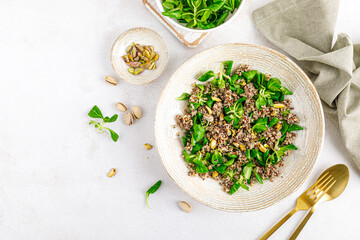 Sticker - Quinoa with corn salad and pistachios. Healthy food. Top view.