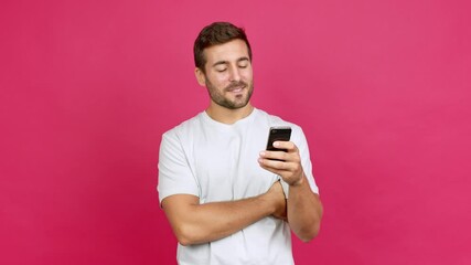 Poster - Handsome man using mobile phone over isolated background