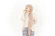 Smelling something stinky and disgusting of Beautiful Asian Woman Wearing Hijab Isolated On White Background