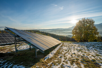 Wall Mural - photovoltaic panels on a mountain meadow in the autumn morning