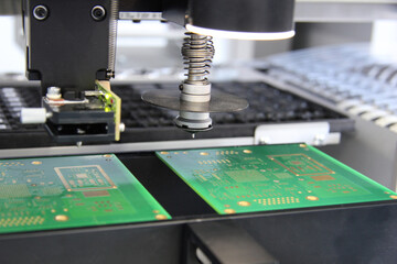 Factory for the electronic production. Technological process of soldering and assembly chip components on pcb board. Automated soldering machine inside