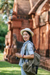 © Johnstocker - Young backpacker female travel in ancient site