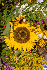 Wall Mural - Traditional bouquet of flowers, herbs and fruits that are the symbol of summer