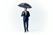 © SHOTPRIME STUDIO - business man in a suit manager office work umbrella in hand