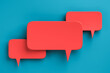 Social media notification icons, red speech bubbles on blue background. 3D rendering
